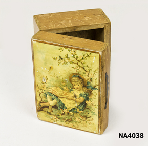 Small square wooden box with a painting of a child reading a book, sitting under a tree.