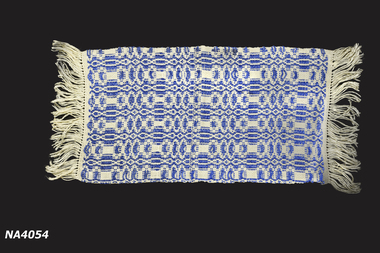 Blue and cream cotton hand woven place mat.