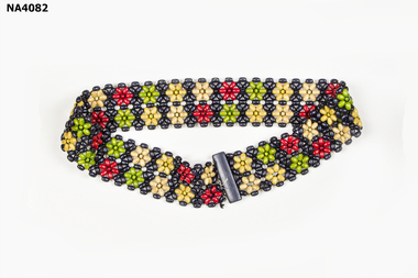 Green, Red, Beige & Dark blue Plastic Beads in the shape of seeds
