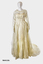 1958 Cream embroidered Nylon wedding dress. Fitted long sleeves to a point at waist, fastened with thirteen self covered buttons. 