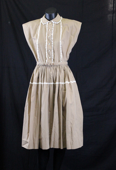 Light brown poplin day dress. Capped sleeves and Peter Pan collar. (front)