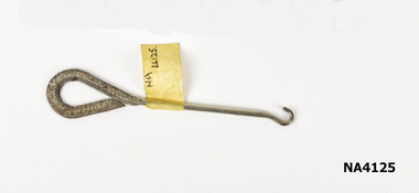 Metal Boot Button Hook.Hook on one end for buttons, bent over loop on other end to form handle.