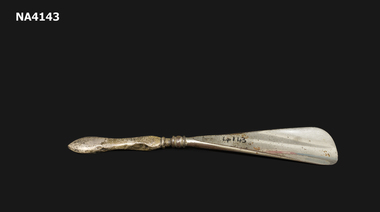 Silver plated shoe horn, pear shaped handle
