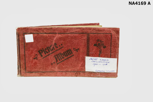 Red cardboard cover which is covered in clear plastic. 'Swap Card collection 1940-1948 