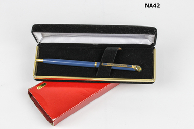 Blue and gold biro pen. 