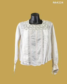 Pale pink muslin with cream lace trim & long sleeves with spoke stitched cuffs.