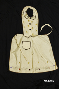 Cream coloured Bib apron,