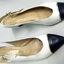 Navy and white sling back shoes. 