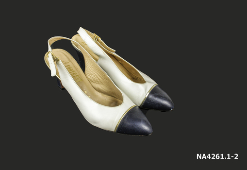 Navy and white sling back shoes. 