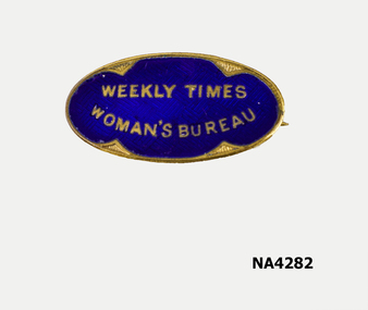 Small oval badge. Blue enamel on gilt metal base with pin on the underneath. Weekly Times .
