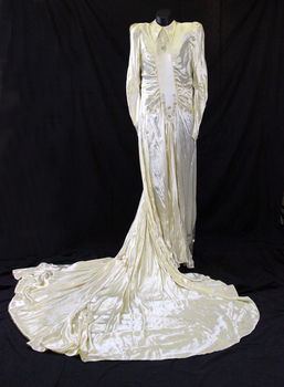 1945 Cream satin  wedding dress with a rouched bodice to a centre panel, high neckline and pointed collar
