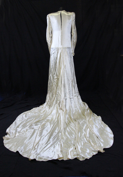 1945 Cream satin  wedding dress with a rouched bodice to a centre panel, high neckline and pointed collar (back)