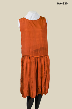 Dress 1920. Orange sleeveless, dropped waistline.