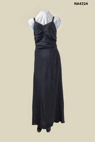 Black crepe evening dress, rouched bodice over bust. 