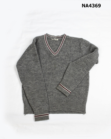 Grey school jumper. 