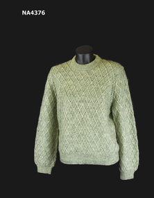 Pale green (eau de nil) mohair jumper knitted in lattice pattern.