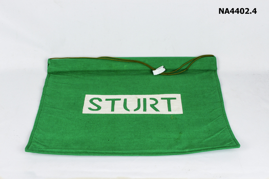 Green School house banners on wooden support with cord attached for hanging. 