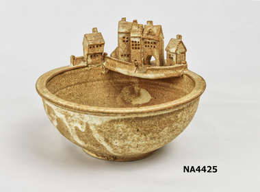  Bisque Pottery Bowl with English style village on the rim. 