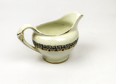 Cream crockery jug, gold rim