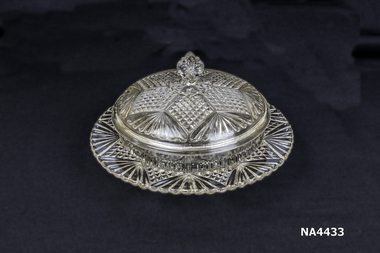 Round glassware base and cover.
