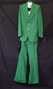 Green two piece suit with shirt and bow tie. 
