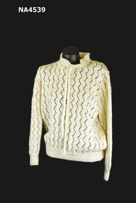 Cream wool jumper; Hand knitted in open zig-zag design.