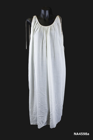 1966 white sleeveless batiste nightgown with salmon pink silk Rouleau ties on shoulders. 