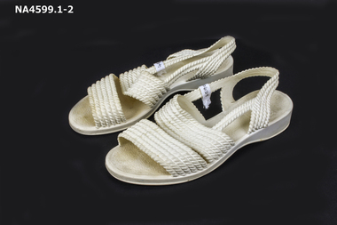 Plastic cream sandals