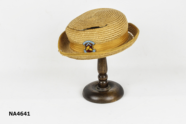 Caramel coloured straw hat for St Thomas The Apostle's Blackburn.