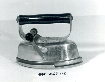 Small travelling iron with stand. Also known as a 'Goffering' iron or 'Sad Iron'. 