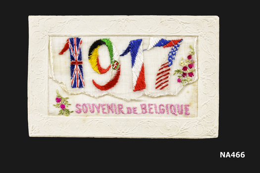 Postcard dated Belgium Oct. 1917 with '1917' and 'souvenir de Belgique' embroidered on front.