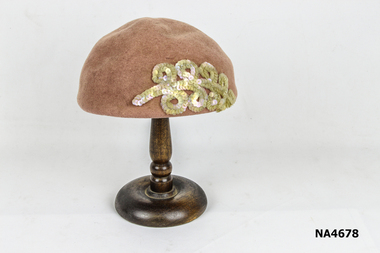 felt skull cap shaped cap. 
