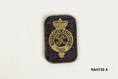 Small leather folder containing Victorian Railways station to station ticket 