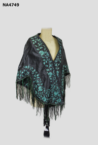 Black Taffeta Cape, embroidered in green silk flowers and leaves. 
