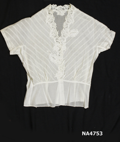 Lace trimmed blouse to the waist,
