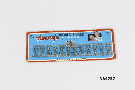 Card of Hooks.E Eyes Oblong piece of cardboard