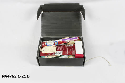 Items inside the grey cardboard box.