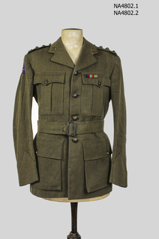 Khaki army woollen jacket with belt which has a metal buckle, rising sun badge on each lapel.