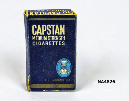 Empty box of Capstan medium strength cigarettes which is navy blue with white writing. 