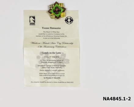 An invitation to 'Lunch on the Lawn' addressed to the donor from the Mayor Philip Daw to cerebrate the 45th Anniversary of the Matsudo sister city relationship with Whitehorse including a small square piece of origami. .