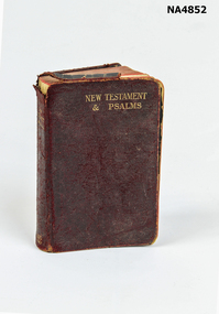 Small leather bound book red colour.