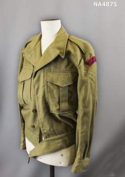 Khaki blouse style jacket with belt.