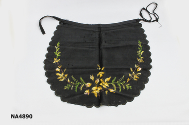 Embroidered black apron