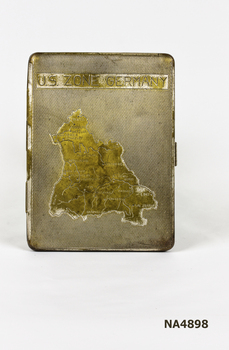 Metal cigarette case. Map on front shows the U.S. Occupied Zone of Germany in the post war years.|