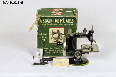 Singer sewing machine and original box. 