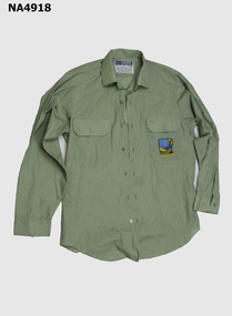 Shirt. Pale olive green long sleeved