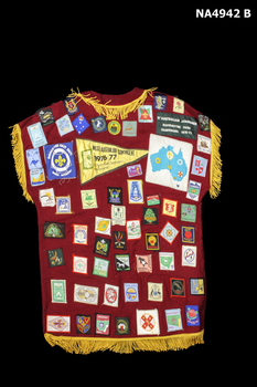 One maroon sleeveless scout jacket  (camp shirt, back)