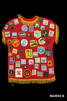 One red sleeveless scout camp (back)
