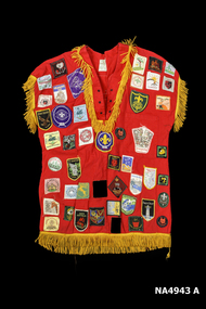 One red sleeveless scout camp shirt (front)