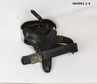 Dark brown leather holster with buckle and strap to secure weapon.